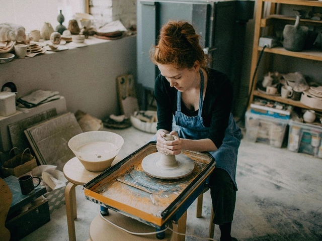 Small business pottery studio manages debt utilization